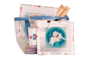 A bag of matches and some papers with pictures on them