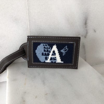 A picture of the letter a on a luggage tag.