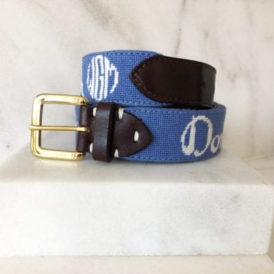 A blue belt with the initials d and o on it.