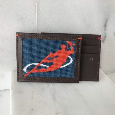 A red and blue wallet with a person on it