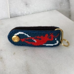 A key chain with a lobster on it.