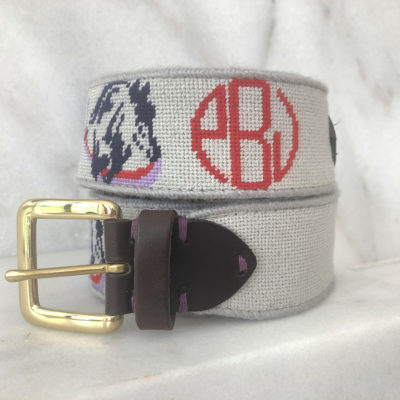 A belt with the initials eb and horse on it.