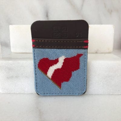 A card holder with a red and white heart on it.