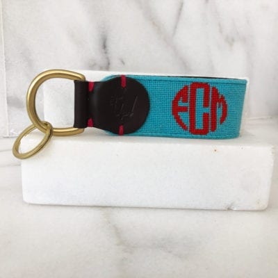 A key chain with the letters e, g and h on it.