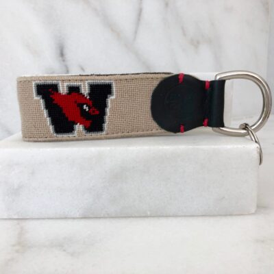 A key chain with the letter w on it.