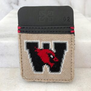 A card holder with the letter w and a cardinal on it.