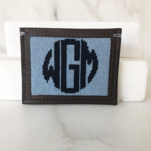 A wallet with the initials wgm on it.