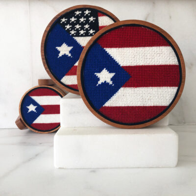 A set of three coasters with the american flag on them.