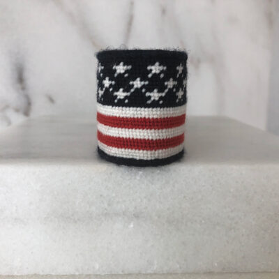 A red, white and blue american flag bracelet.