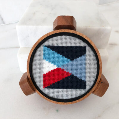 A cross stitch pattern of an abstract design.