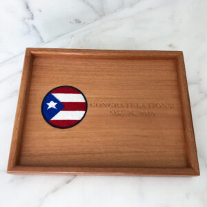 A wooden tray with the flag of puerto rico on it.