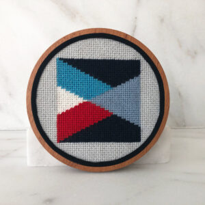 A cross stitch pattern of an abstract design.