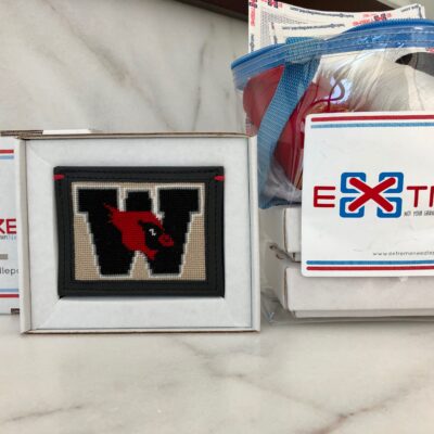 A picture of the letter w in a frame.